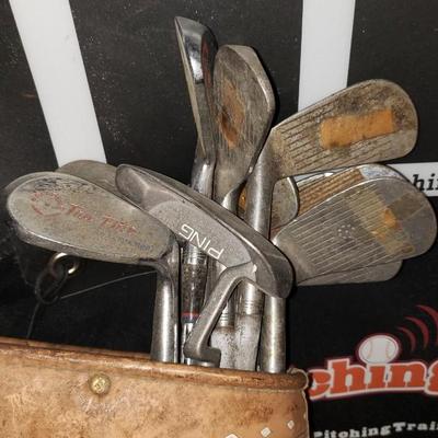 Bag of antique golf bags, some Spalding