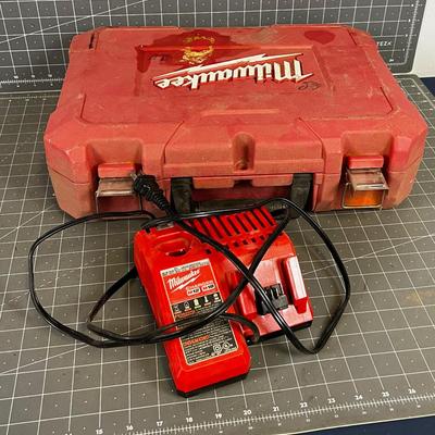 Milwaukee Cordless Drill Box with Charge Only. 