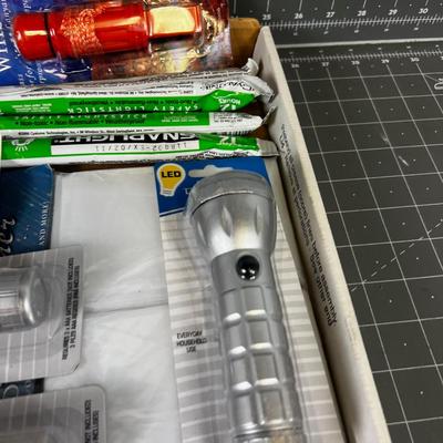 Emergency Items: Whistle, Blanket, Flashlight, Fire Starter