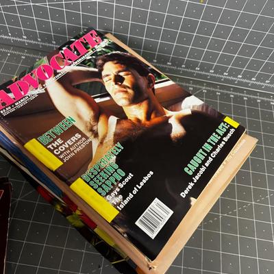 Stack of the Advocate Magazine 