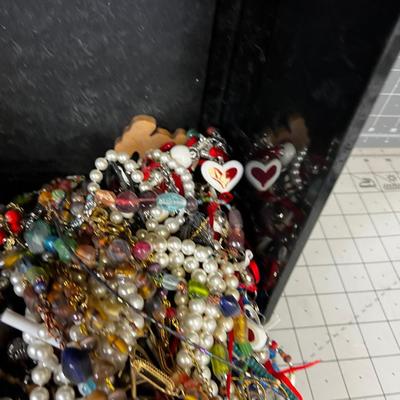 Tub Full of Necklaces