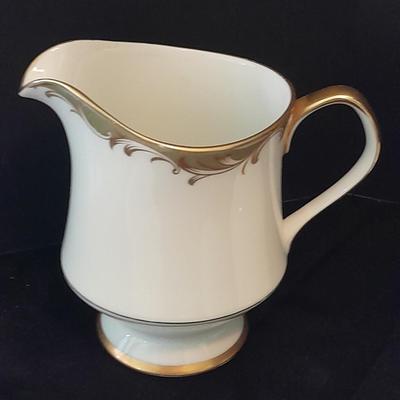 Nice variety of Dishware / chinaware and a neat wooden and wire basket