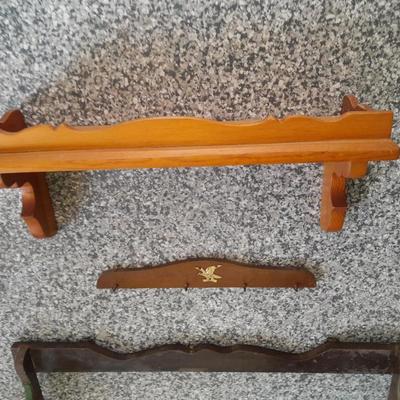 Vintage wooden gun rack, and a wall shelf