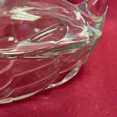 Glass duck on nest