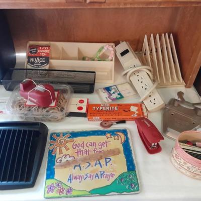 Assortment of office supplies, vintage typewriter items, power strip, office organization and more