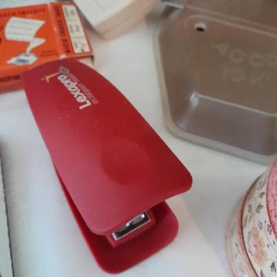 Assortment of office supplies, vintage typewriter items, power strip, office organization and more