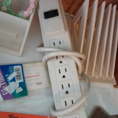 Assortment of office supplies, vintage typewriter items, power strip, office organization and more