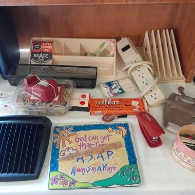 Assortment of office supplies, vintage typewriter items, power strip, office organization and more