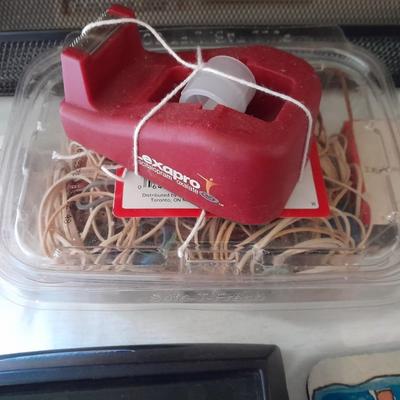 Assortment of office supplies, vintage typewriter items, power strip, office organization and more