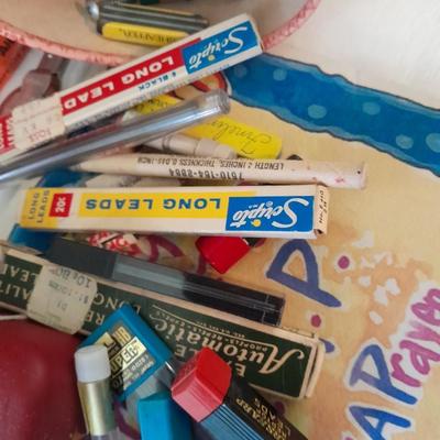 Assortment of office supplies, vintage typewriter items, power strip, office organization and more