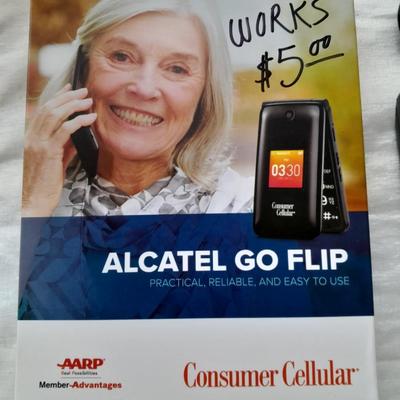 Two vintage Cell phones consumer cellular flip phone & Motorola MicroTAC with instructions & chargers