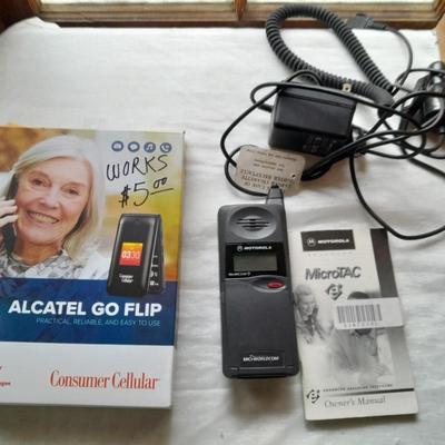 Two vintage Cell phones consumer cellular flip phone & Motorola MicroTAC with instructions & chargers