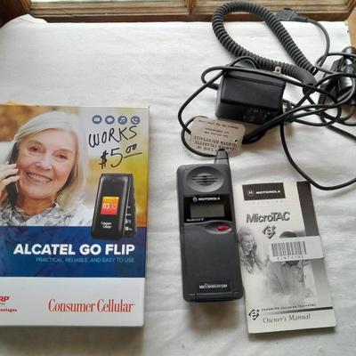 Two vintage Cell phones consumer cellular flip phone & Motorola MicroTAC with instructions & chargers