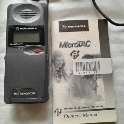 Two vintage Cell phones consumer cellular flip phone & Motorola MicroTAC with instructions & chargers