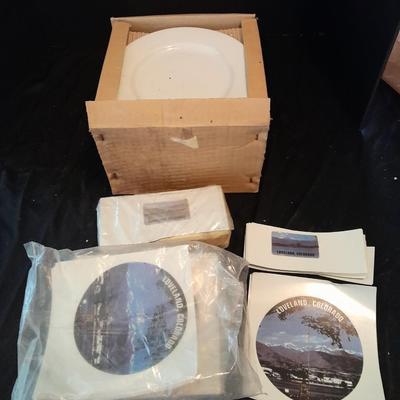 12 white salad plates with Loveland Colorado scenery transfers in boxes (2)