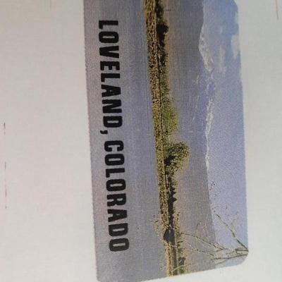 12 white salad plates with Loveland Colorado scenery transfers in boxes (2)