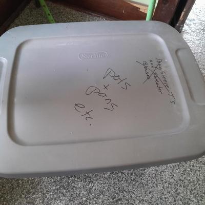 Four Plastic Storage totes of various sizes