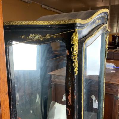Lot 105 | Intricate Convex Glass Cabinet