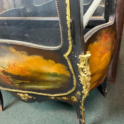 Lot 105 | Intricate Convex Glass Cabinet
