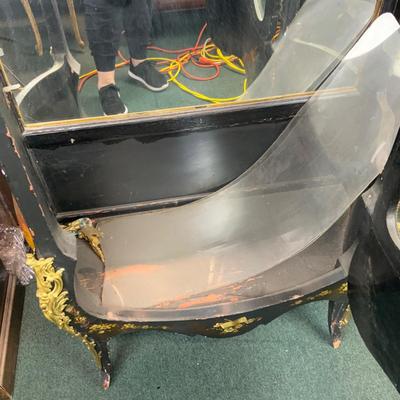Lot 105 | Intricate Convex Glass Cabinet