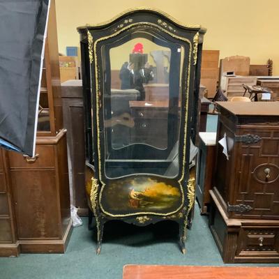 Lot 105 | Intricate Convex Glass Cabinet