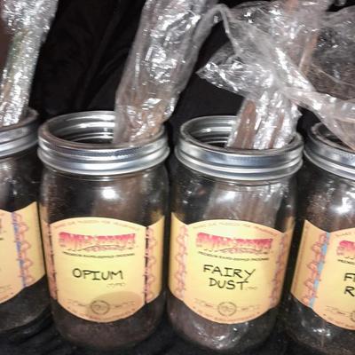 Wildberry incense stand with jars of different scented incense sticks