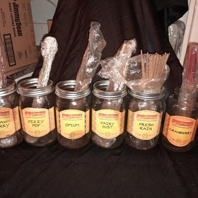 Wildberry incense stand with jars of different scented incense sticks