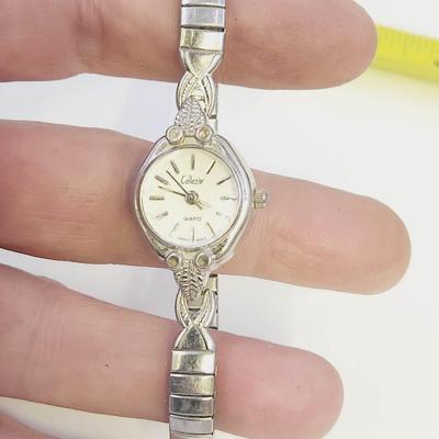 COLLEZIO QUARTZ DAINTY SILVER TONED WRIST WATCH - STRETCHY BAND