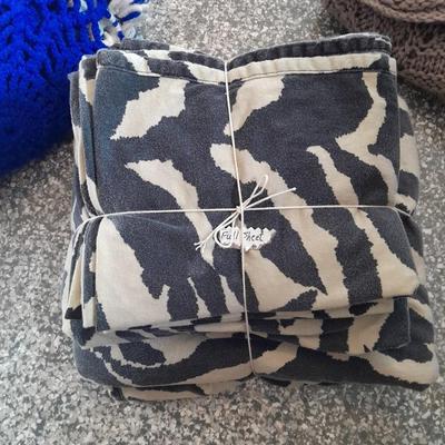 Full size sheet set, rose body pillow case and two Afghan throw blankets