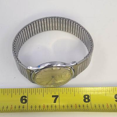 TIMEX QUARTZ M CELL WATER RESISTANT SILVER TONED STRETCHY BAND WATCH