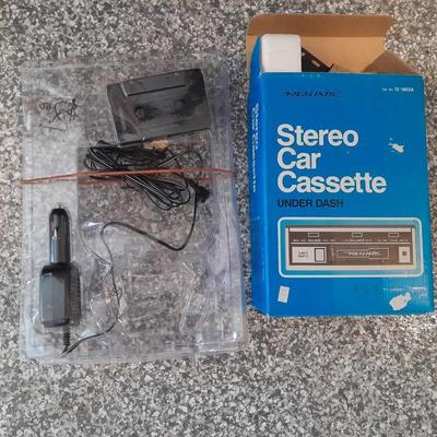 New in the box, vintage Realistic stereo car cassette player Under dash mount includes all hardware!
