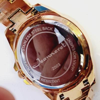 NEW JEANERETTE ROSETTA II PURPLE FACE W/ CRYSTALS GOLD TONED BAND WATCH IN ORIGINAL PACKAGING