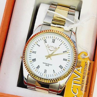 NEW ACTIVA SILVERTONED & GOLDTONED WHITE FACED WATCH IN ORIGINAL PACKAGING