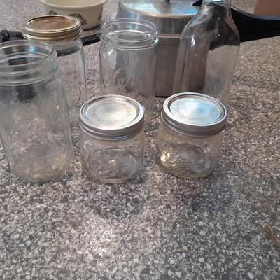 Pressure cooker, canning jars, and enamel pot with lid, and a MASON STAR JAR