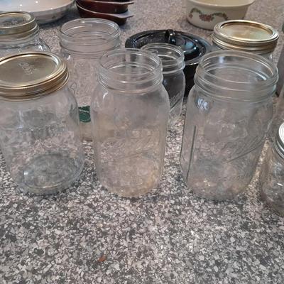 Pressure cooker, canning jars, and enamel pot with lid, and a MASON STAR JAR