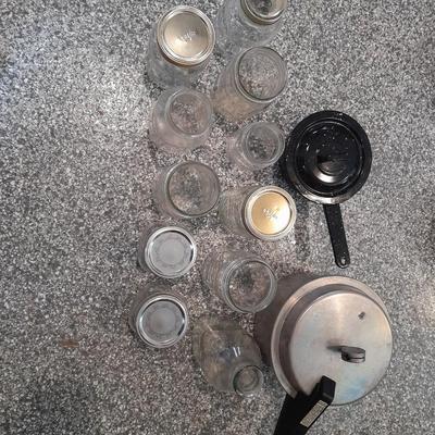 Pressure cooker, canning jars, and enamel pot with lid, and a MASON STAR JAR