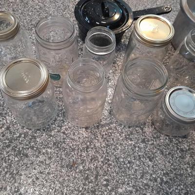 Pressure cooker, canning jars, and enamel pot with lid, and a MASON STAR JAR
