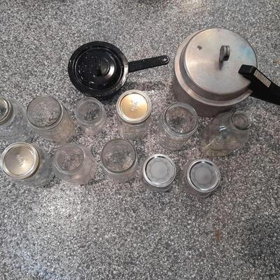 Pressure cooker, canning jars, and enamel pot with lid, and a MASON STAR JAR
