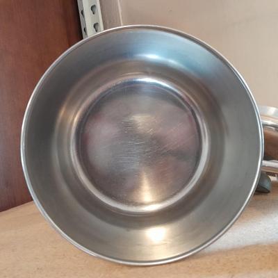 Two Stainless Revere ware saucepans with lids and an enamel pan with no lid