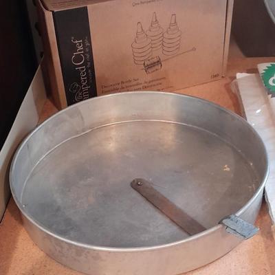 Cake pans, tower cake, Wilton Cake decorating Pampered Chef Decorator bottle set and more