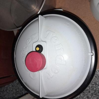 Aluminum Bundt pan, tender cooker, small Corning ware pan, and more.