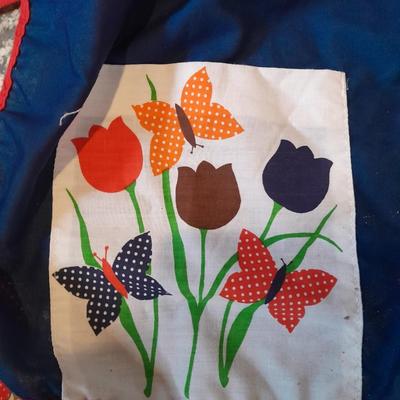 Three vintage aprons, Cacharel napkins, and two table cloths