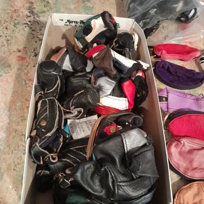 A whole bunch of leather keychains, golf bags, cars, leather jackets, and fanny packs