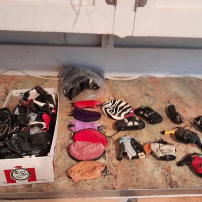 A whole bunch of leather keychains, golf bags, cars, leather jackets, and fanny packs