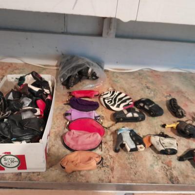 A whole bunch of leather keychains, golf bags, cars, leather jackets, and fanny packs