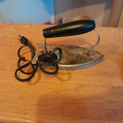 Antique wooden Ironing board and Vintage electric Clothes Iron with clothespins in bag