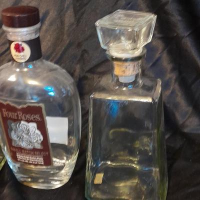 Empty Alcohol bottles with stoppers make wonderful vases!