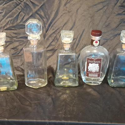 Empty Alcohol bottles with stoppers make wonderful vases!