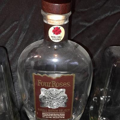 Empty Alcohol bottles with stoppers make wonderful vases!