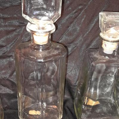 Empty Alcohol bottles with stoppers make wonderful vases!